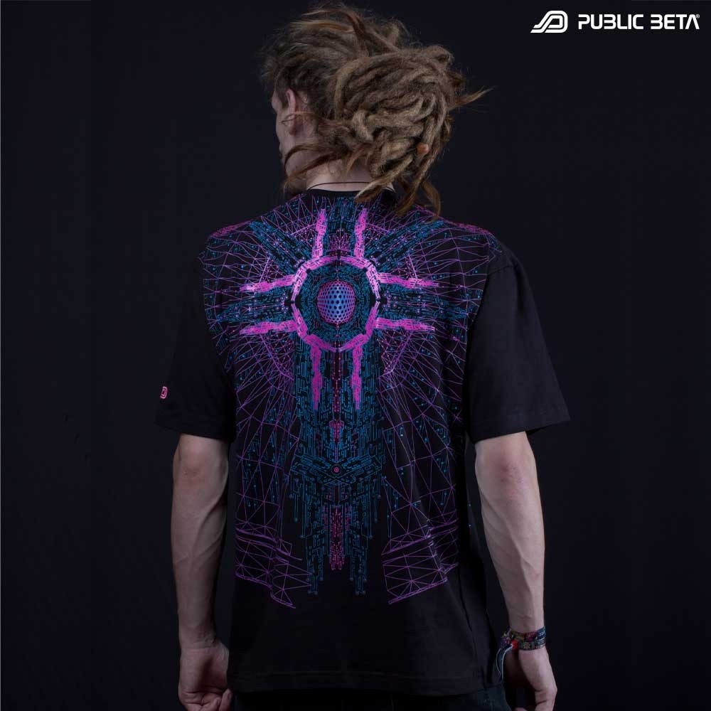 Model wearing a T-shirt with geometric UV-reactive graphics, photographed in natural light