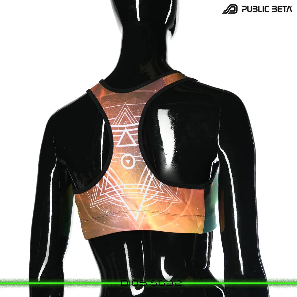 Active top with geometric UV-reactive graphics, photographed in natural light