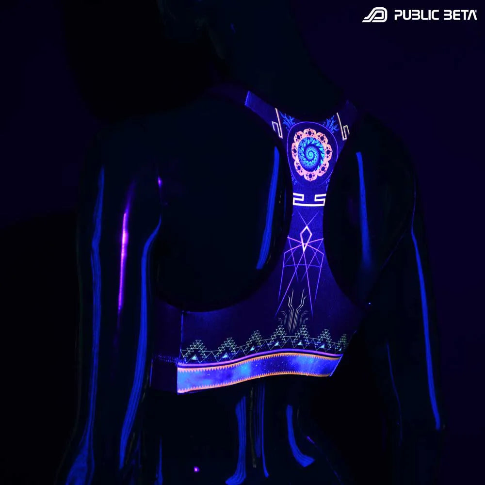 Active top with UV-reactive psychedelic art print glowing under blacklight