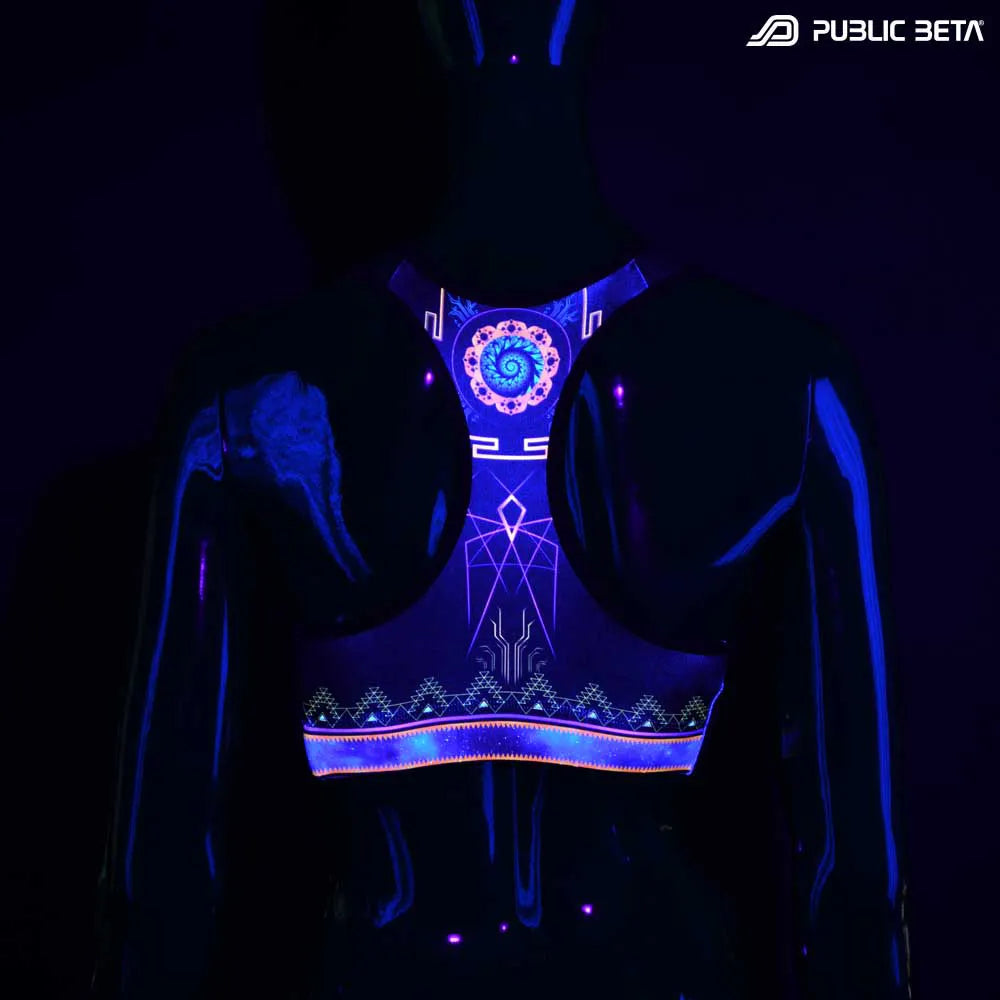 Active top with UV-reactive psychedelic art print glowing under blacklight