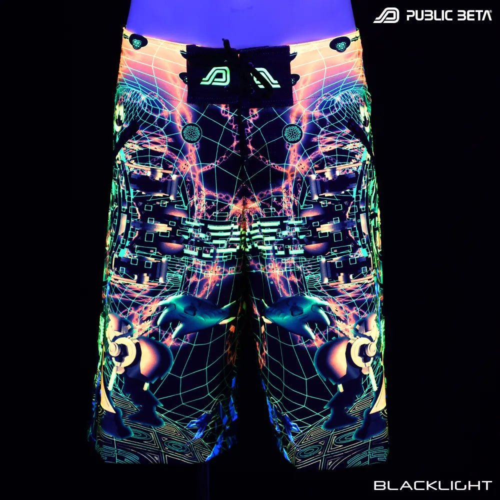 Boardshorts with UV-reactive futuristic print glowing under blacklight 