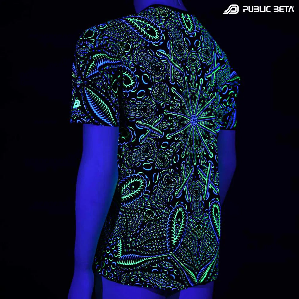 T-shirt with dense pattern UV-reactive graphics glowing under blacklight