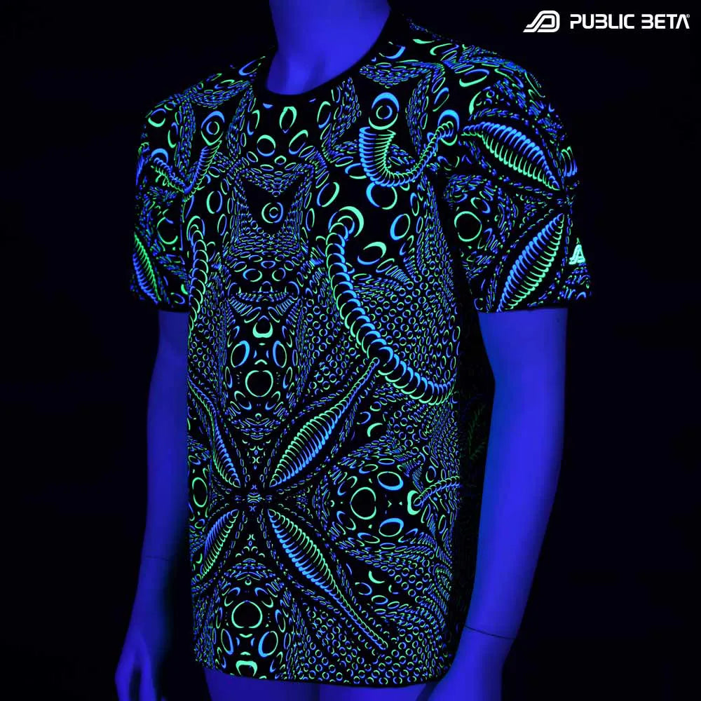 T-shirt with dense pattern UV-reactive graphics glowing under blacklight