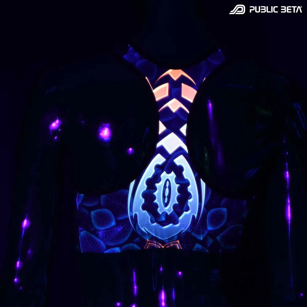 Active top with organic UV-reactive print glowing under blacklight