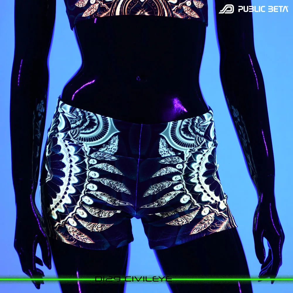 Shorts women with UV-reactive graphics glowing under blacklight front view
