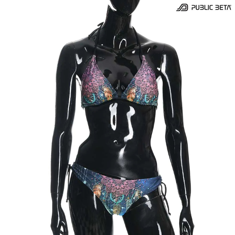 Bikini  set with UV-reactive printed graphics, photographed in natural light
