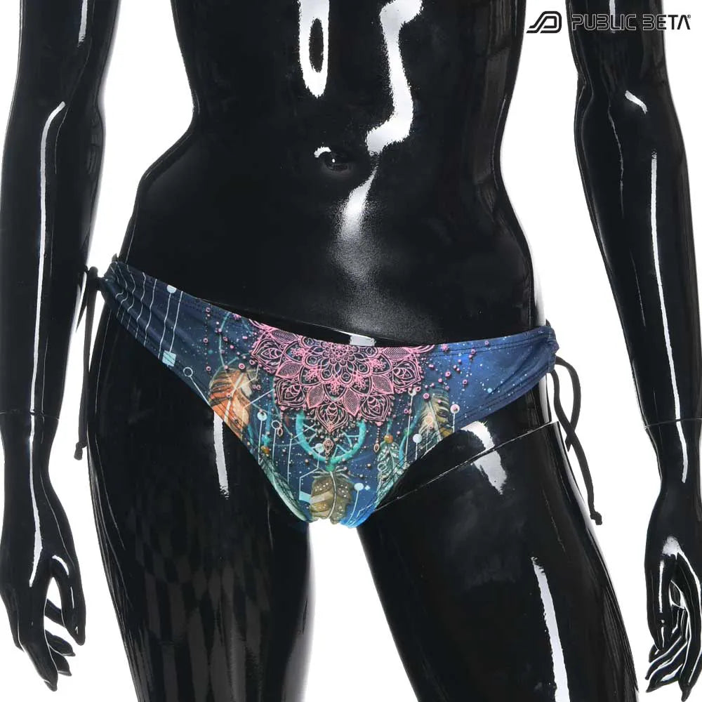 Bikini  set with UV-reactive printed graphics, photographed in natural light