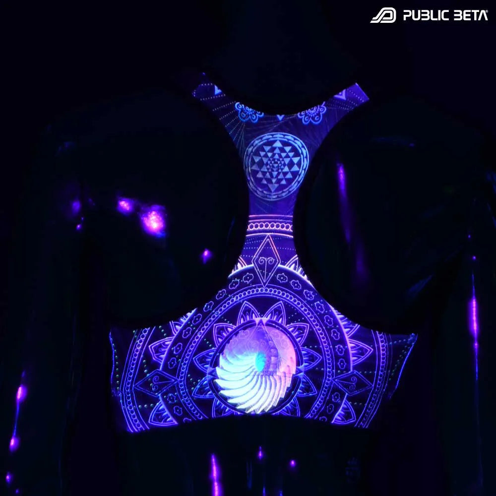 Active top with UV-reactive printed graphics glowing under blacklight
