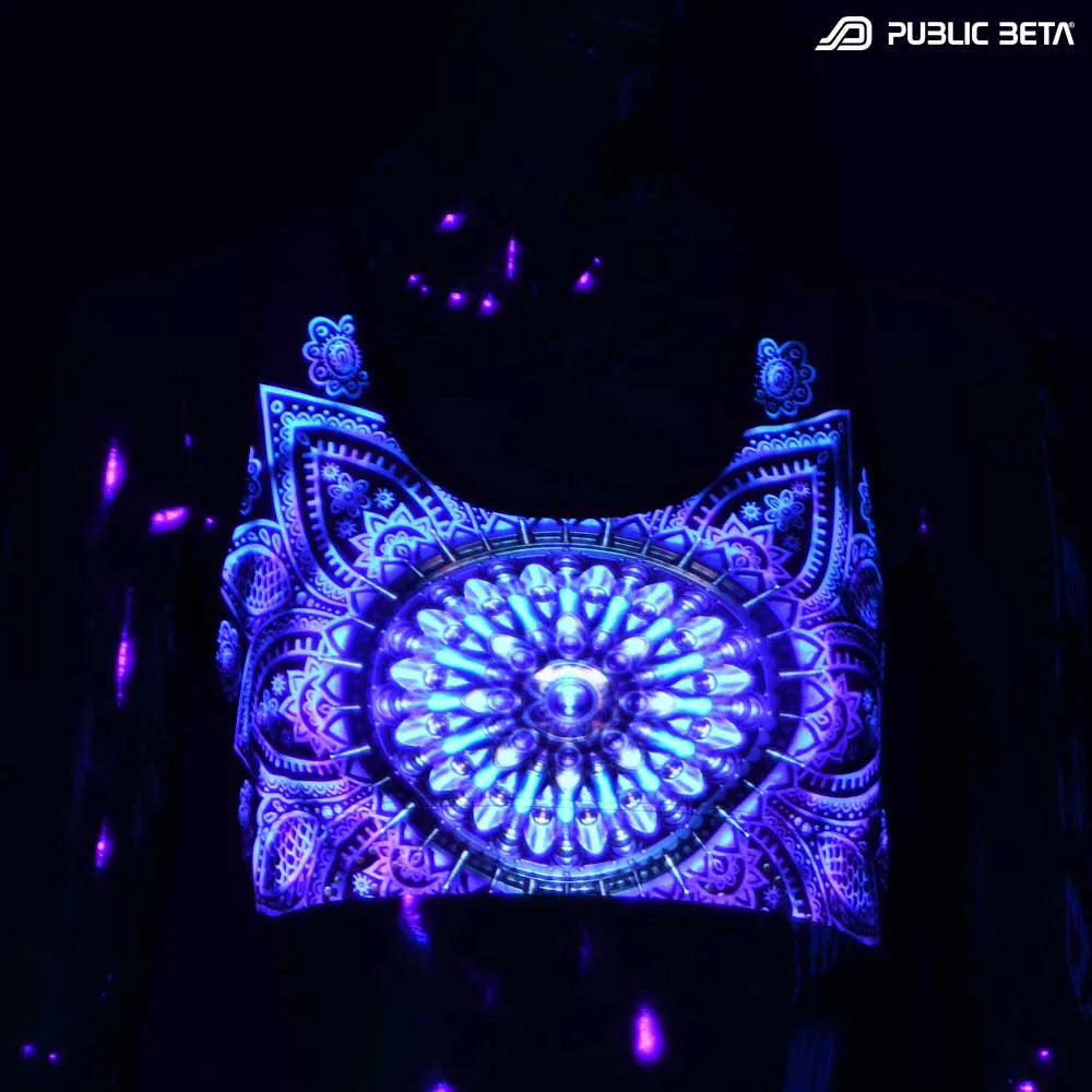 Active top with UV-reactive printed graphics glowing under blacklight