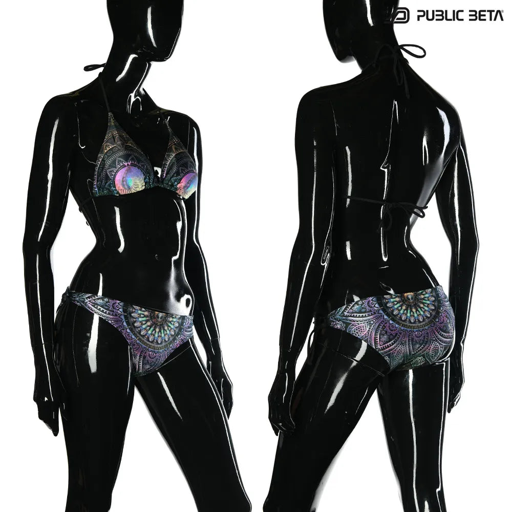 Bikini set with UV-reactive printed graphics, photographed in natural light