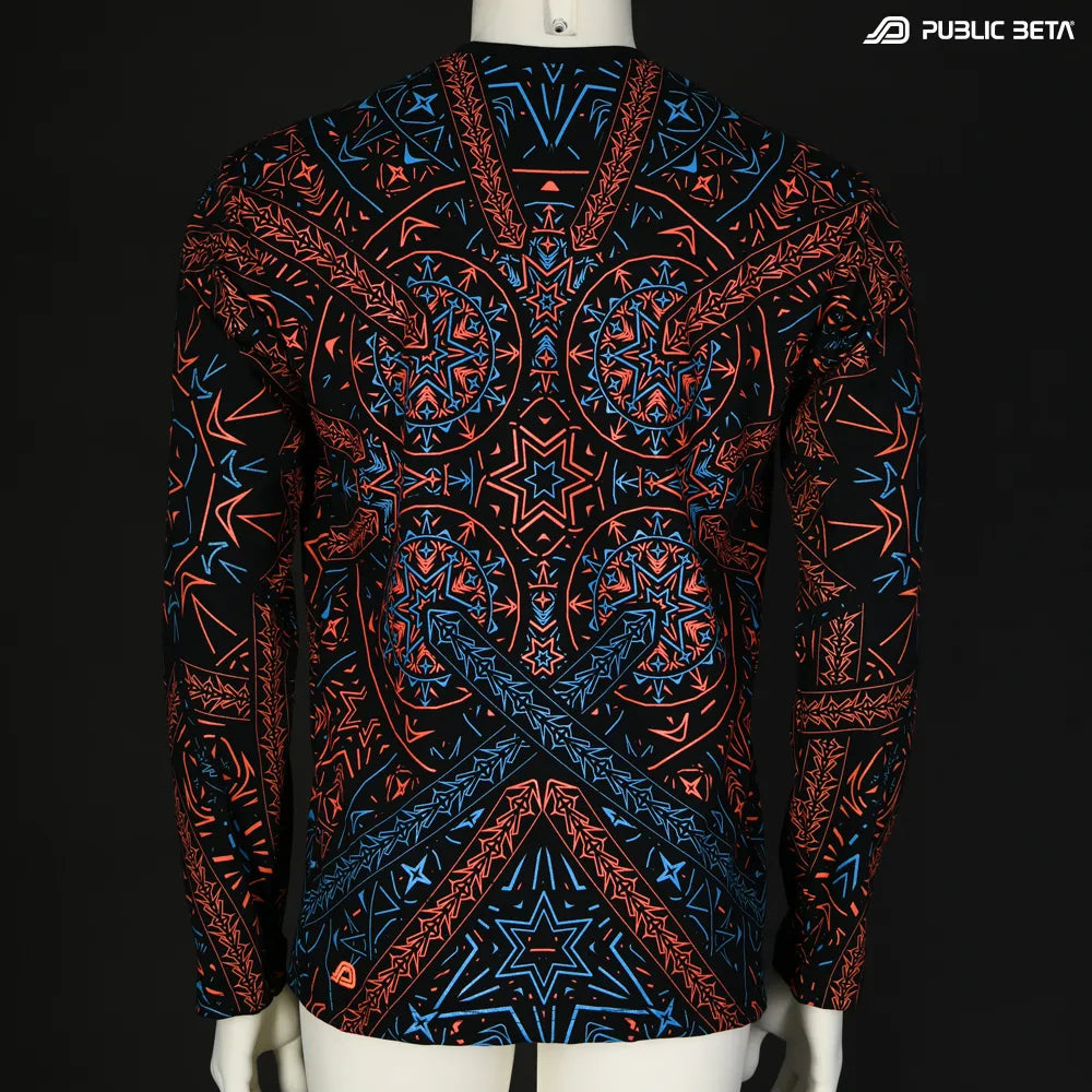Longsleeve with UV-reactive futuristic graphics, photographed in natural light