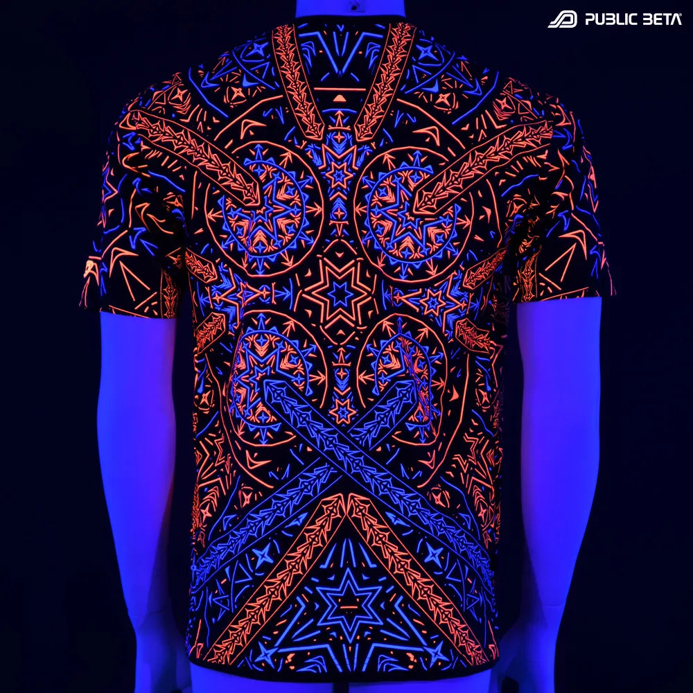 Back of a T-shirt with geometric UV-reactive graphics glowing under blacklight