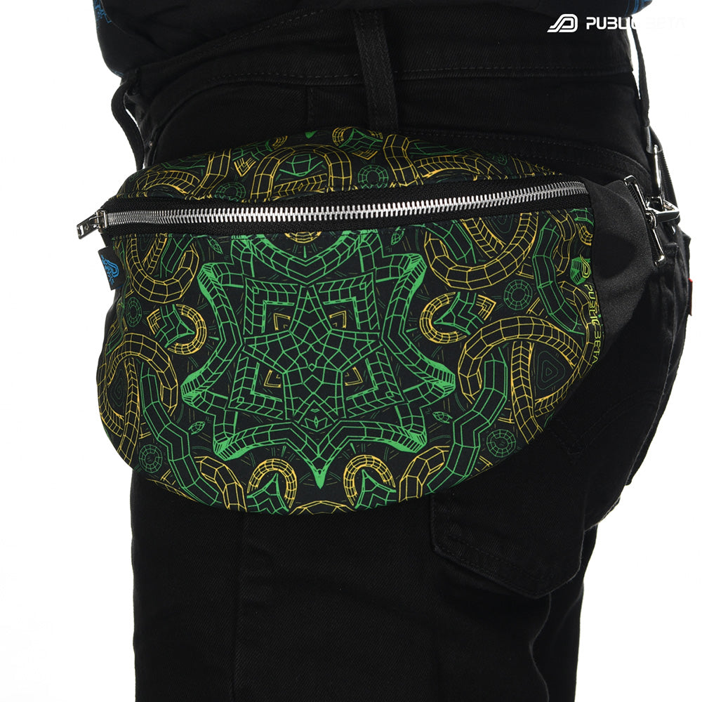 Bum bag with green and gold Celtic knotwork mandala print, photographed in natural light