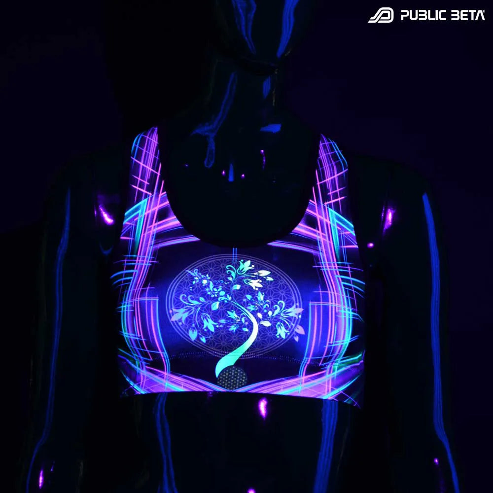 Active top with UV-reactive psychedelic art print glowing under blacklight