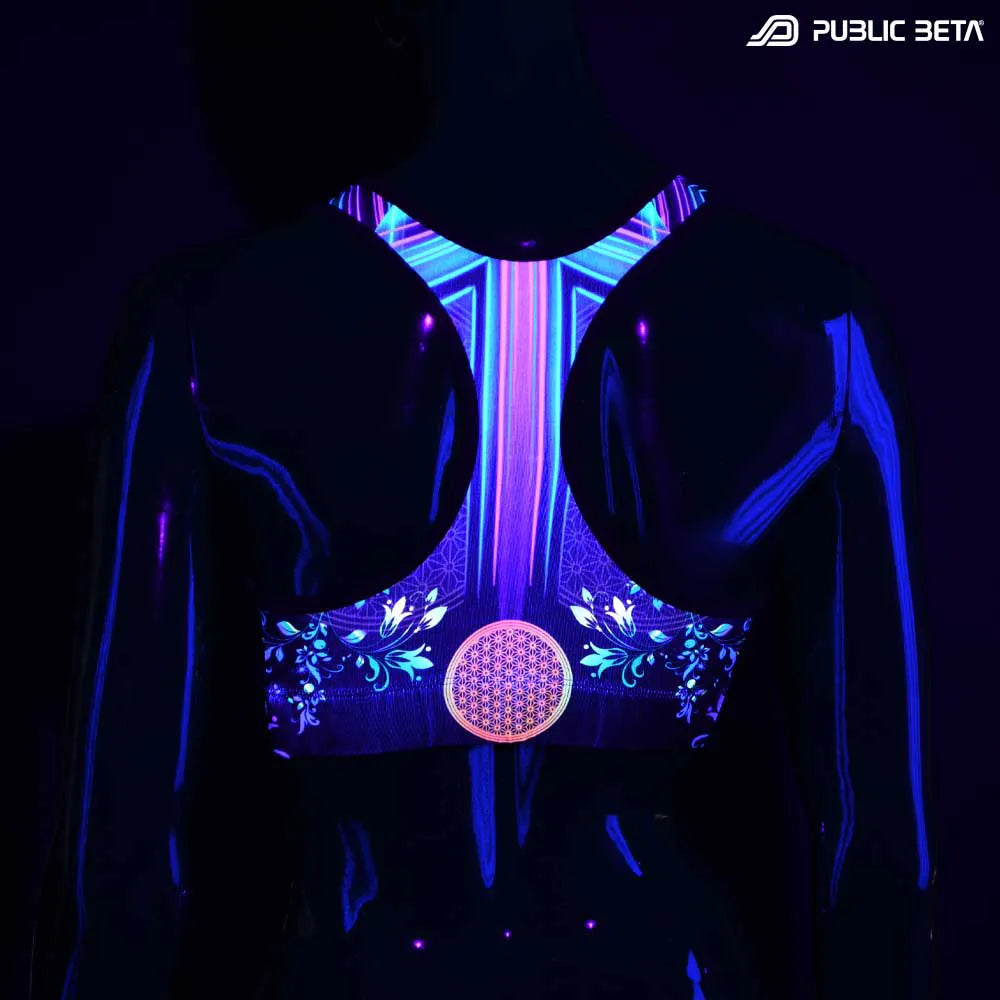 Active top with UV-reactive psychedelic art print glowing under blacklight