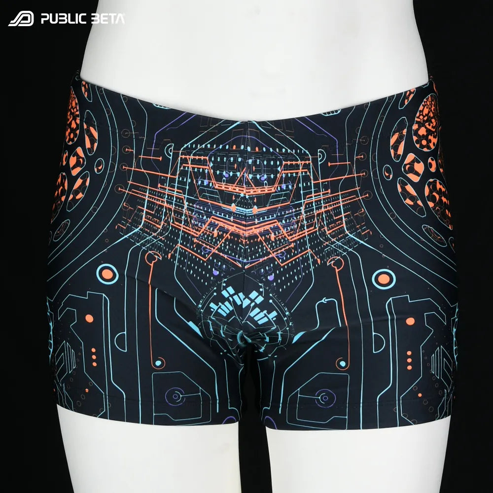 Swim shorts with UV-reactive psychedelic art print, photographed in natural light