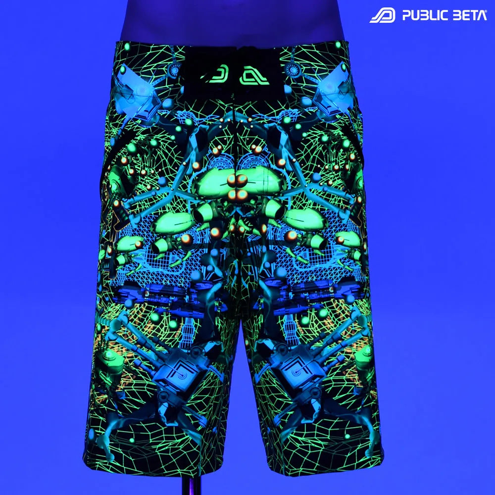Boardshorts with UV-reactive psychedelic print glowing under blacklight