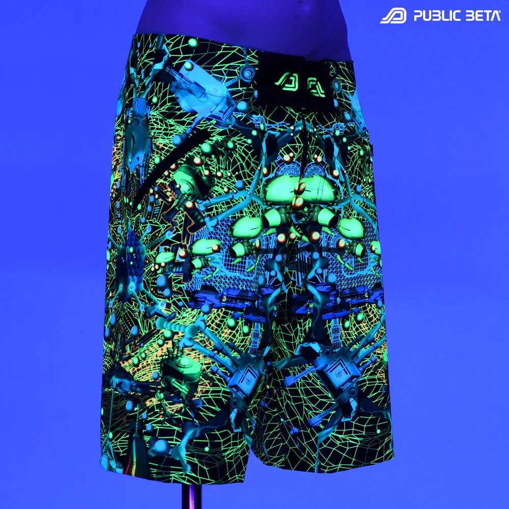 Boardshorts with UV-reactive psychedelic print glowing under blacklight