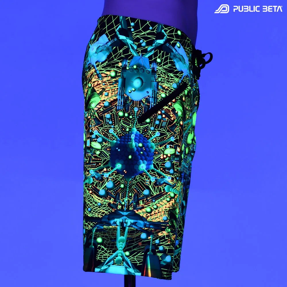 Boardshorts with UV-reactive psychedelic print glowing under blacklight