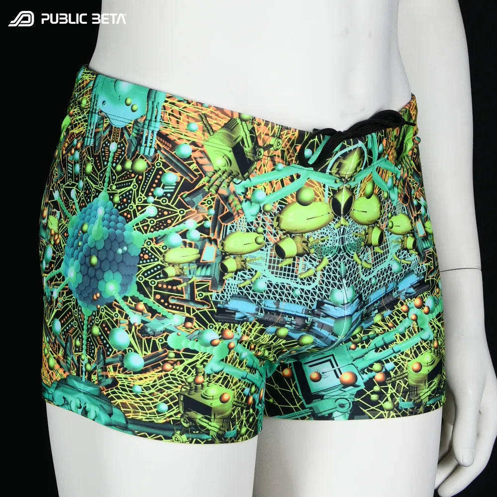 Swim shorts with all-over UV-reactive print, photographed in natural light