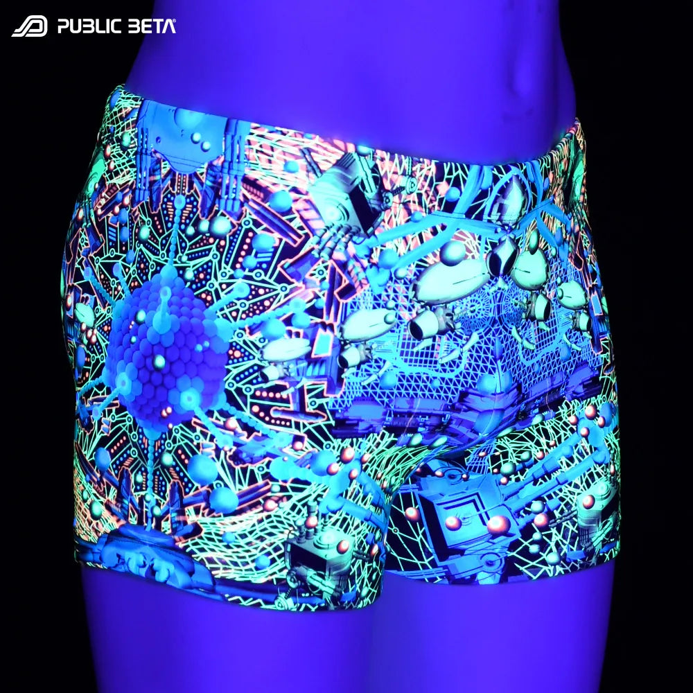 Swim shorts with UV-reactive futuristic print glowing under blacklight