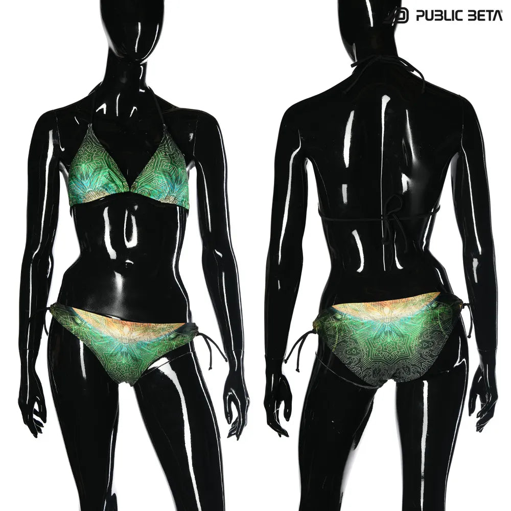 Bikini set with UV-reactive printed graphics, photographed in natural light