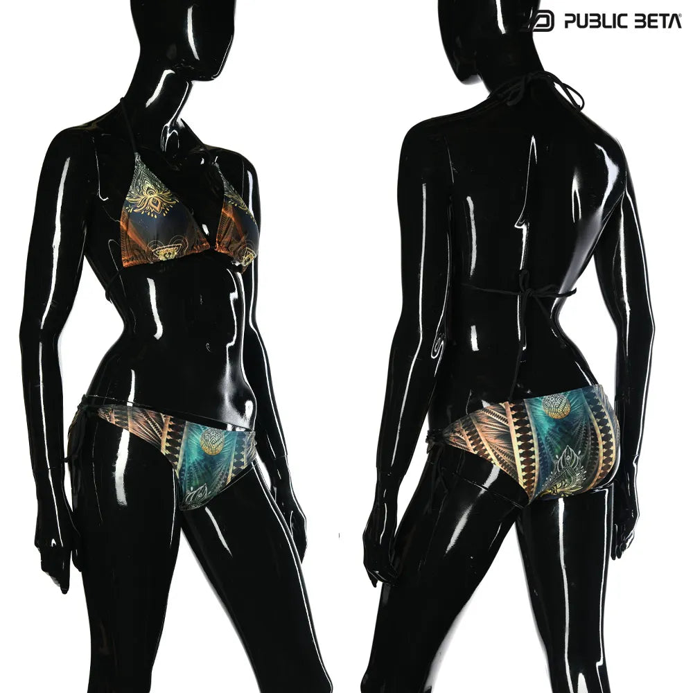 Bikini set with UV-reactive printed graphics, photographed in natural light