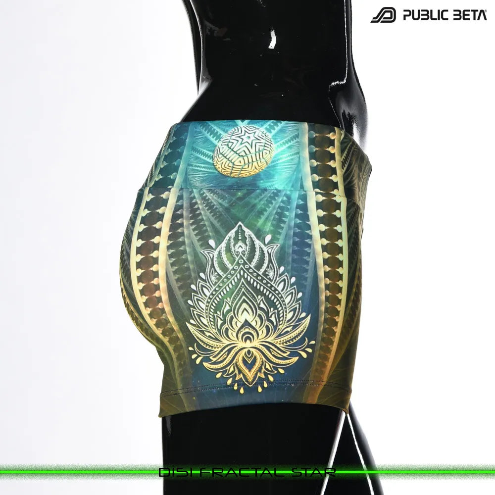 Shorts women with UV-reactive printed graphics, photographed in natural light side view