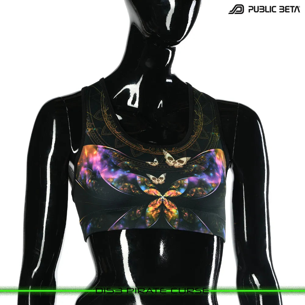 Active top with organic UV-reactive print, photographed in natural light