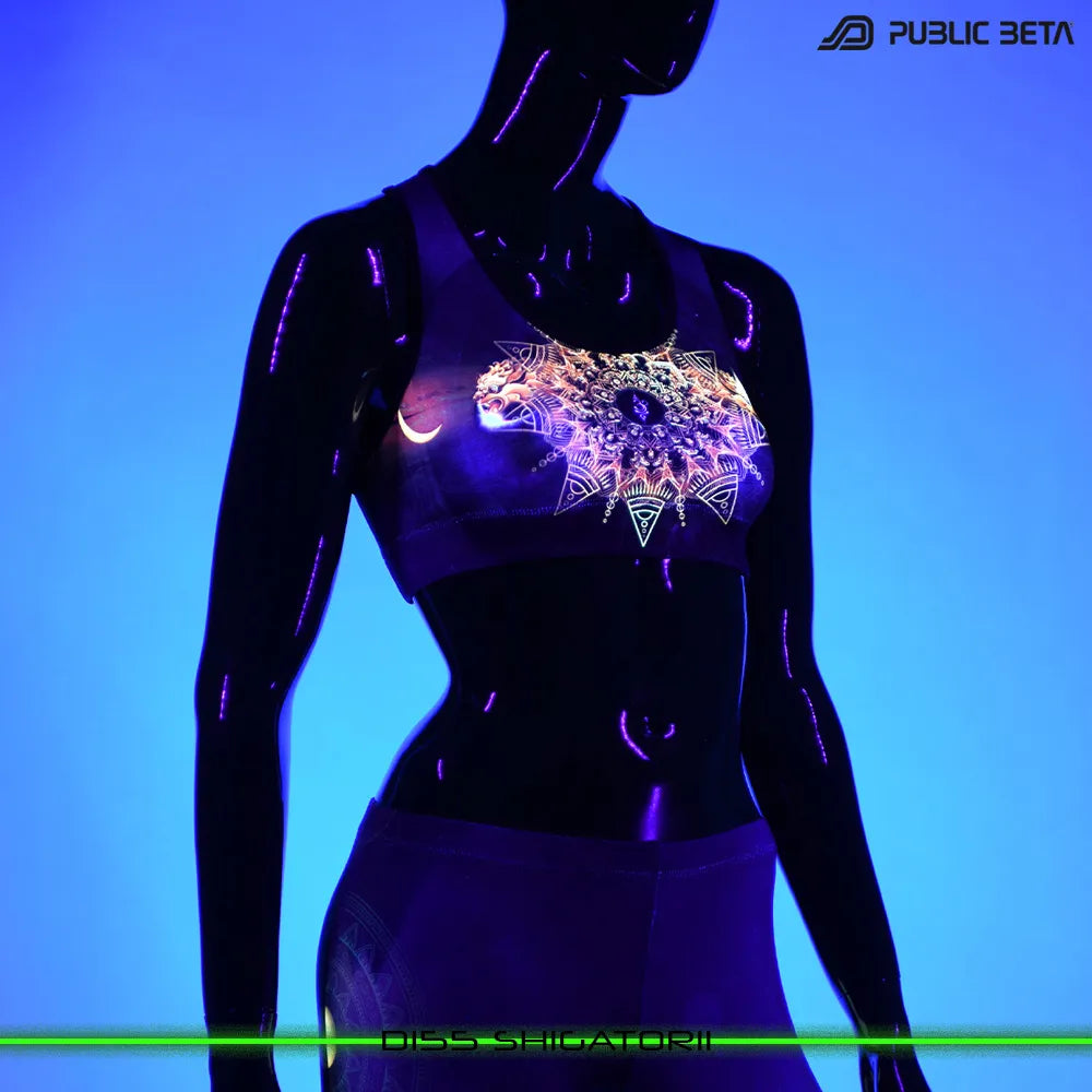 Active top with UV-reactive psychedelic print glowing under blacklight
