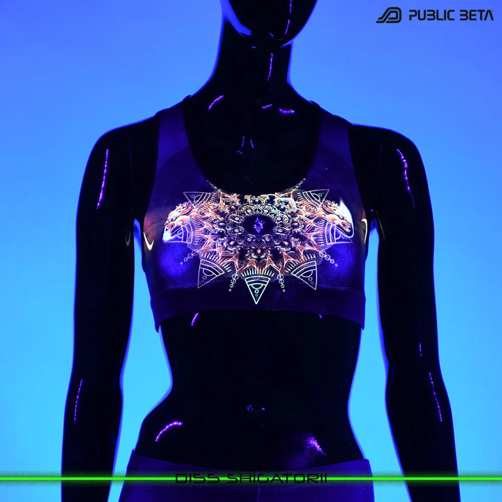 Active top with UV-reactive psychedelic print glowing under blacklight