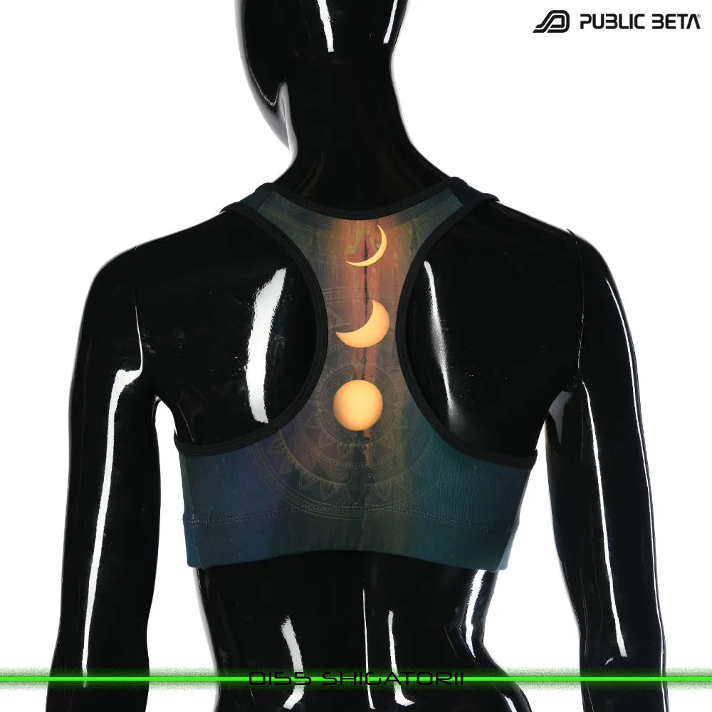 Active top with UV-reactive printed graphics, photographed in natural light