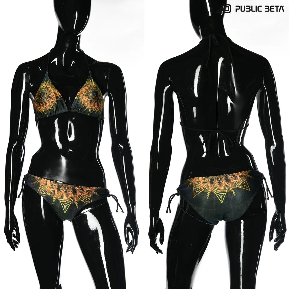 Bikini with UV-reactive printed graphics, photographed in natural light