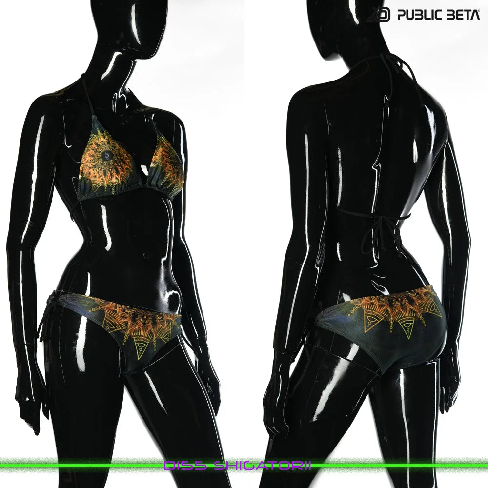 Bikini with UV-reactive printed graphics, photographed in natural light