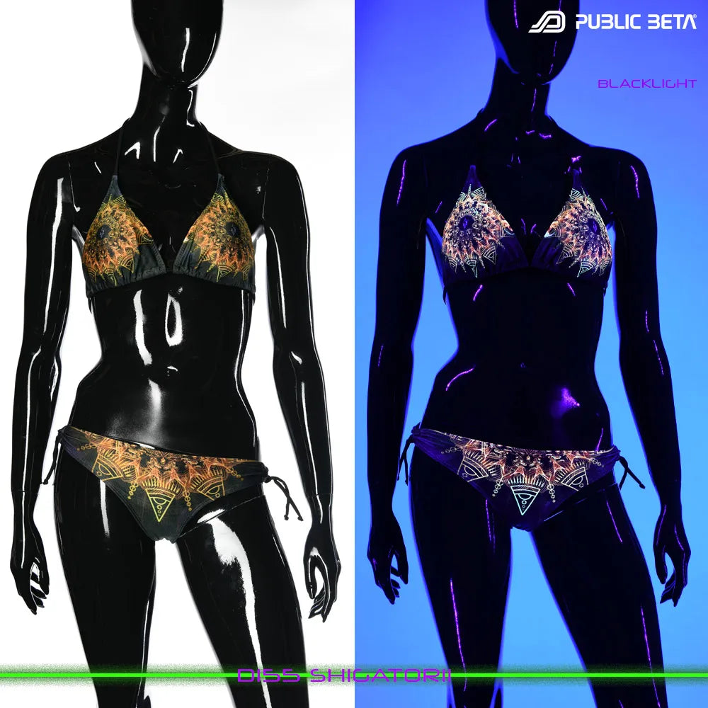 Bikini set with UV-reactive graphics glowing under blacklight