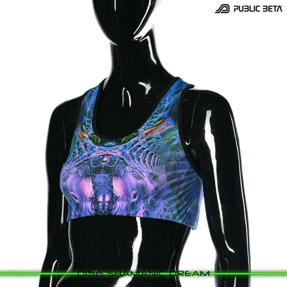 Active top with UV-reactive futuristic graphics, photographed in natural light