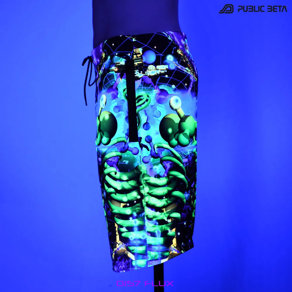 Boardshorts with UV-reactive psychedelic print glowing under blacklight