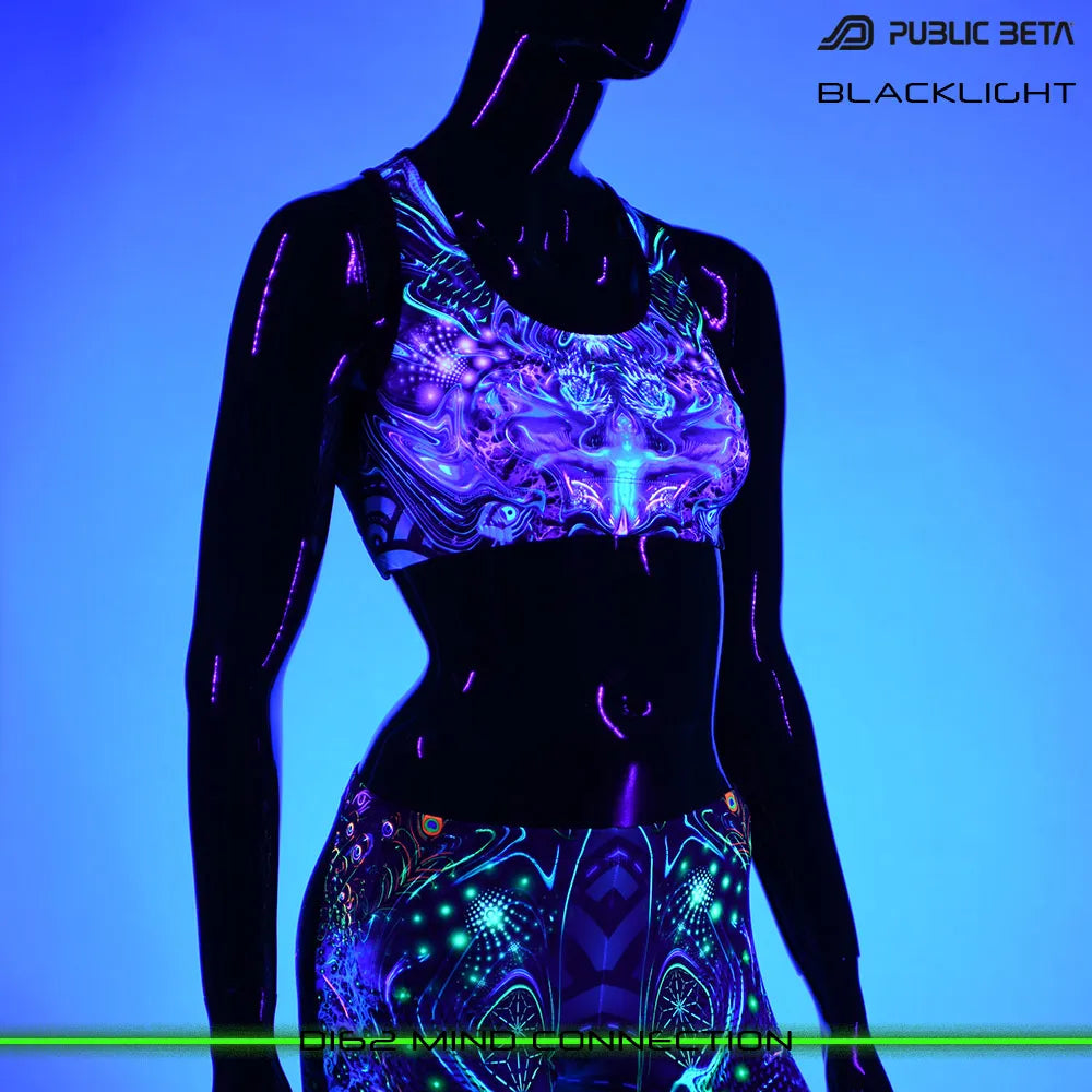 Active top with organic UV-reactive print glowing under blacklight