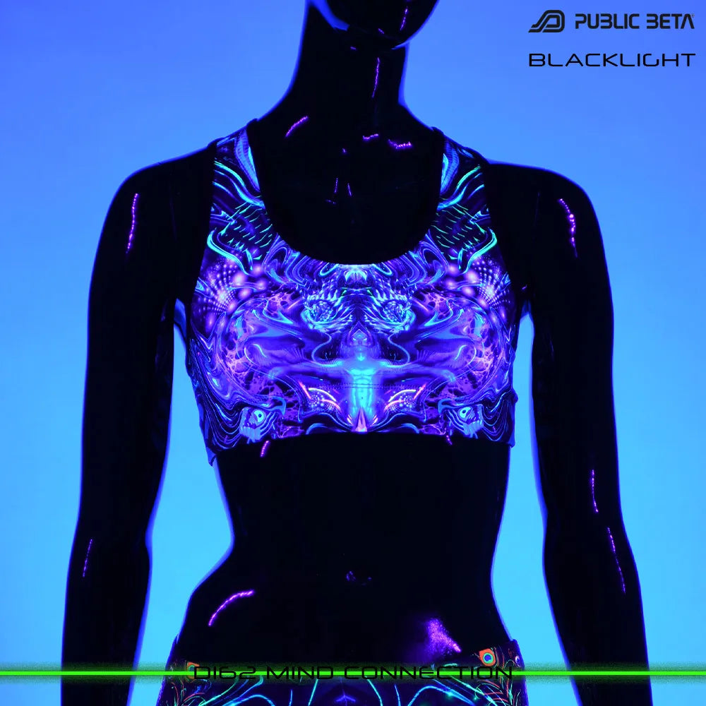 Active top with organic UV-reactive print glowing under blacklight
