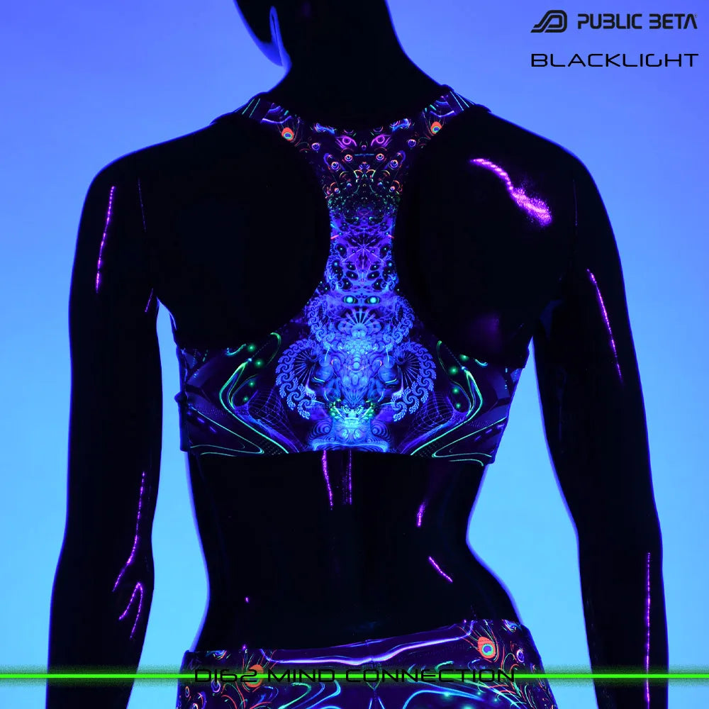 Active top with organic UV-reactive print glowing under blacklight