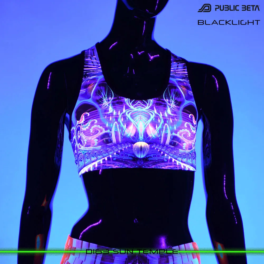Active top with UV-reactive futuristic print glowing under blacklight