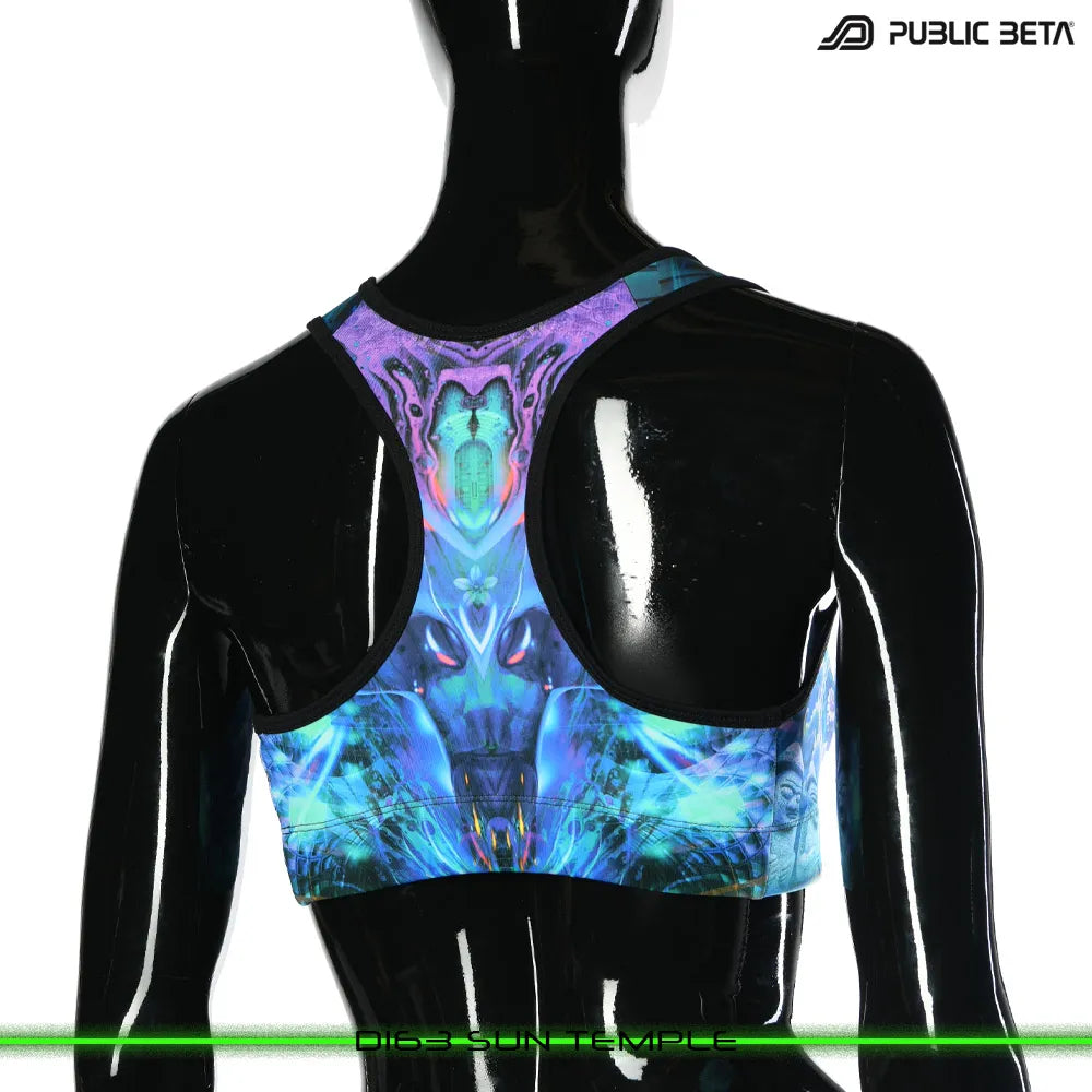 Active top with UV-reactive futuristic graphics, photographed in natural light