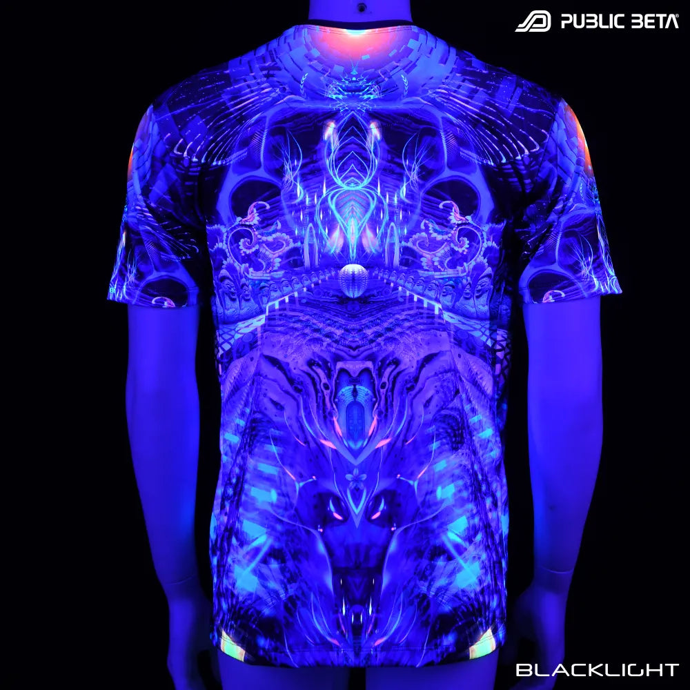 T-shirt with all-over UV-reactive print glowing under blacklight