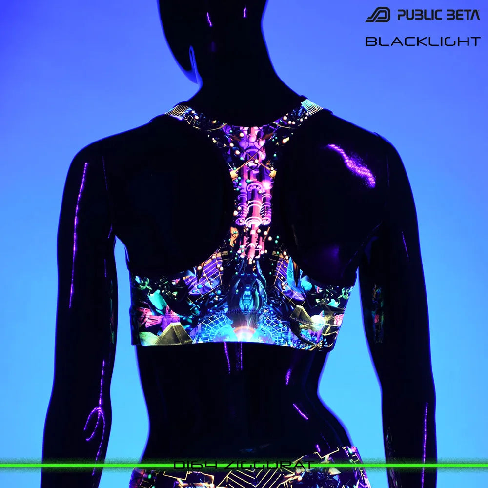 Active top with UV-reactive futuristic print glowing under blacklight