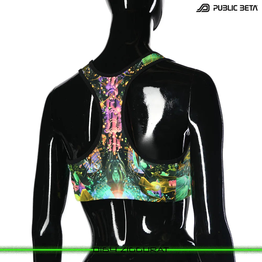 Active top with UV-reactive futuristic graphics, photographed in natural light