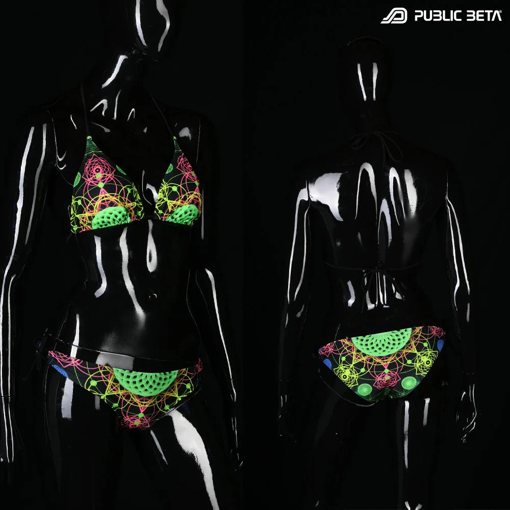 Bikini set with UV-reactive printed graphics, photographed in natural light