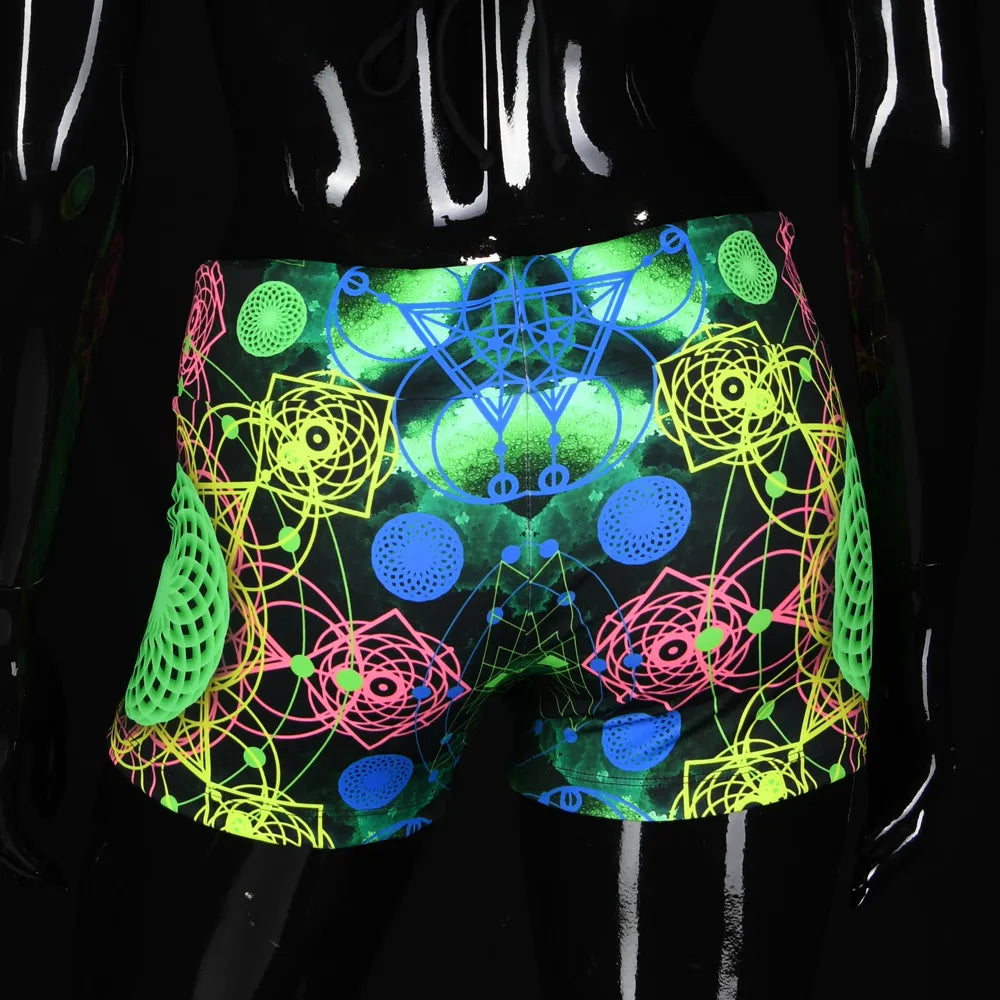 Shorts women with UV-reactive printed psychedelic graphics, photographed in natural light