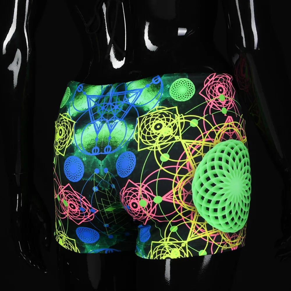 Shorts women with UV-reactive printed psychedelic graphics, photographed in natural light back