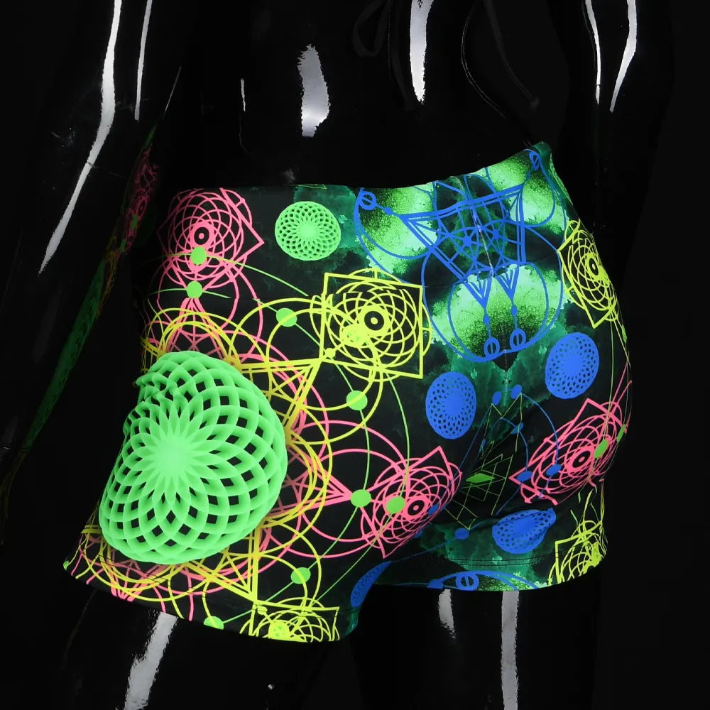 Shorts women with UV-reactive printed psychedelic graphics, photographed in natural light back