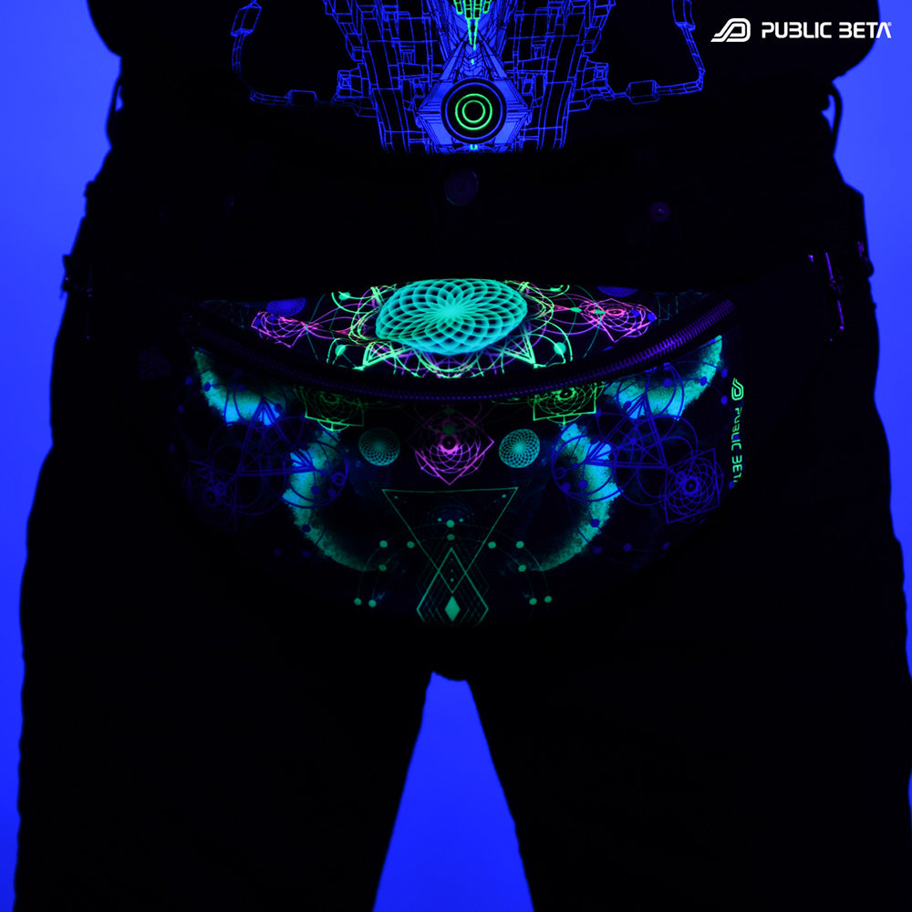Bum bag with turquoise and pink sacred geometry vajra mandala print glowing under blacklight
